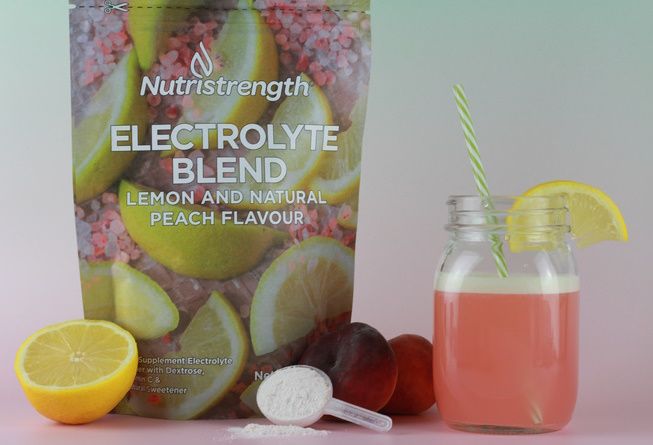 electrolyte blend with lemon and peach in the forground